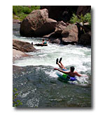 Tubers run the rapids on the North Fork of the Upper South Platte River.